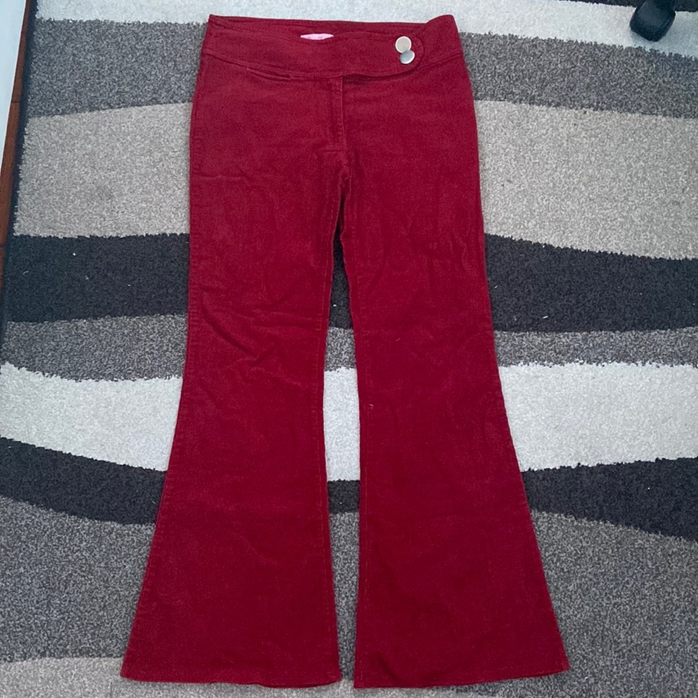 LizethFashion red flared pants has a rlly small pocket from the front not ripped